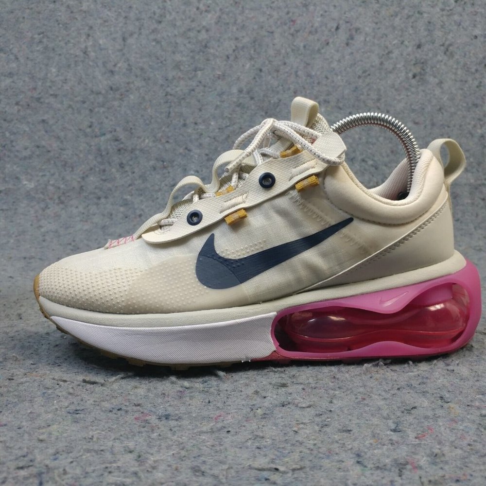 Nike Cream and Pink Athletic Shoes